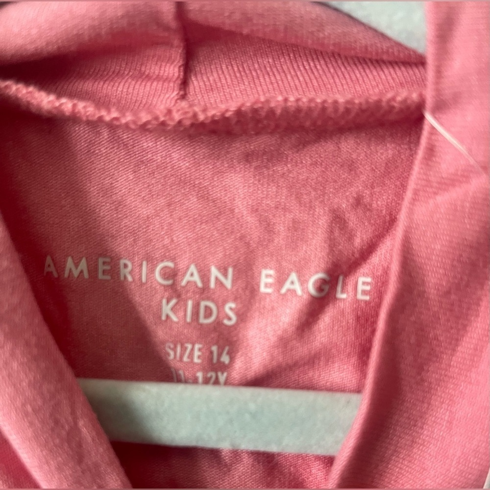 American Eagle Kids Pink Top
Size 14 
NWT - Picture 3 of 4